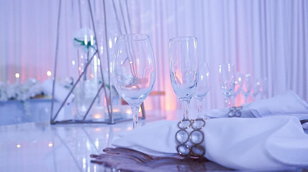 Crystal glassware and elegant table setting detail at RA Event Center